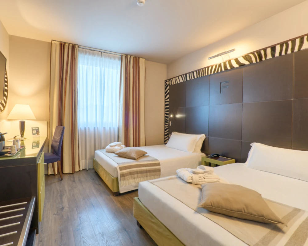 dettaglio letti singoli camera executive First Hotel